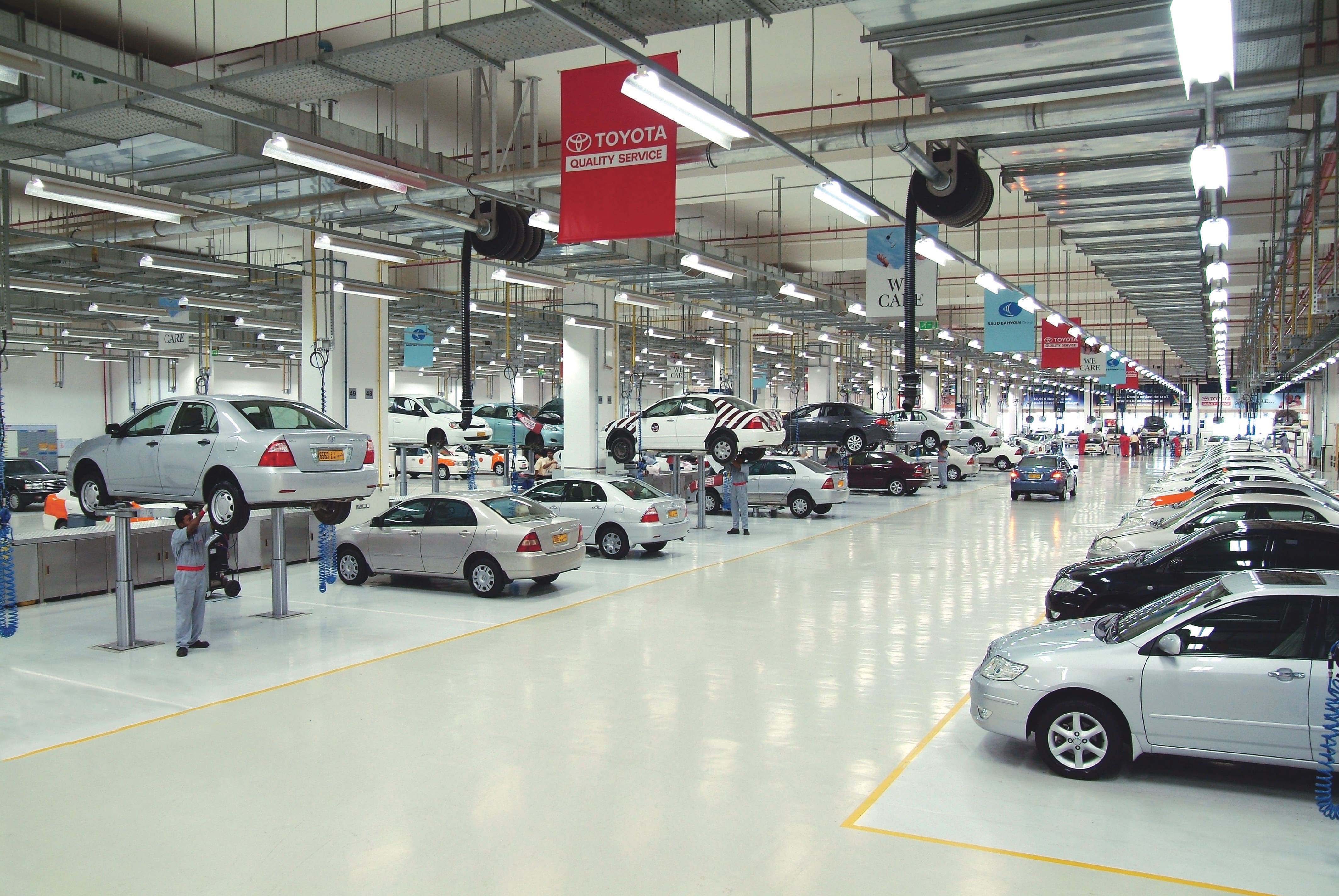 Employees doing a final check of toyota oman cars autoparts