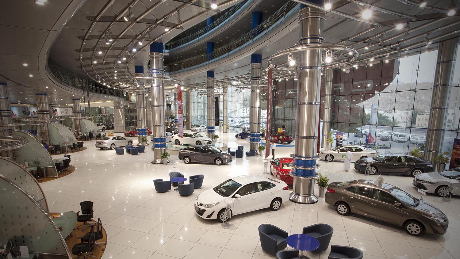 Inside view of Saud Bahwan's showroom showcasing different automotive dealers